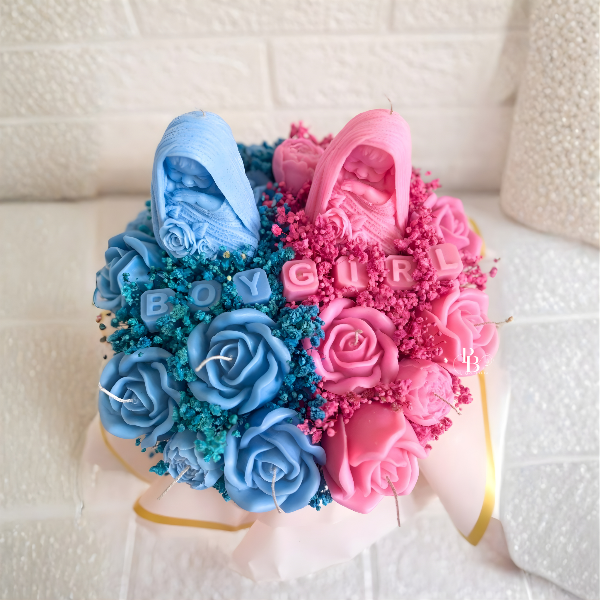 Twin floral candle bouquet with blue and pink roses, boy and girl print, gold trim
