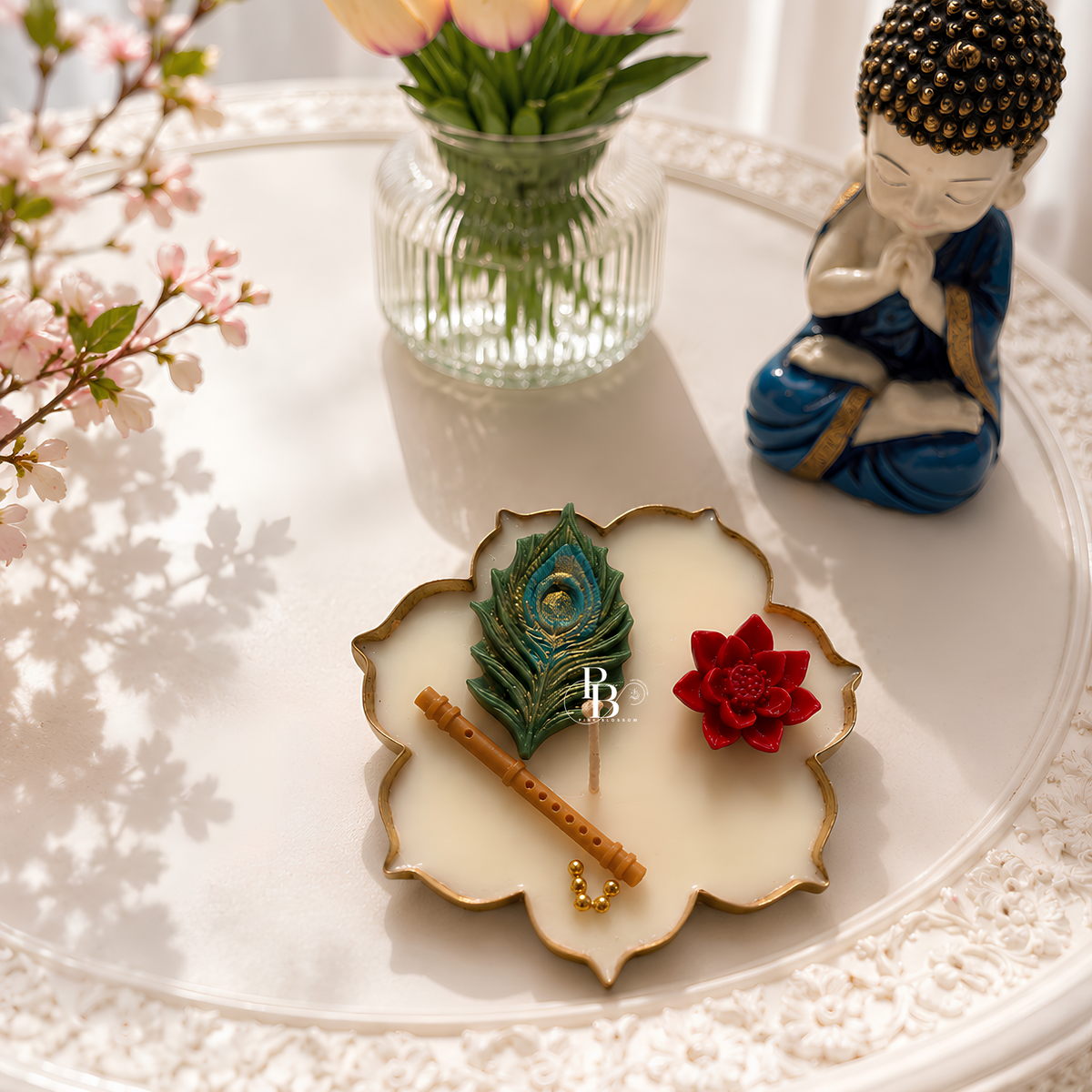 Murali Manohar™ decorative candle on round tray, peacock feather and red flower wax