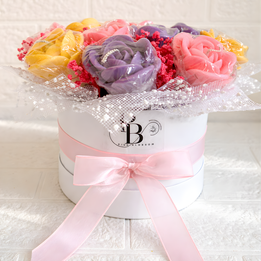 Pink floral tray candle in white box with pink satin bow and multi-color roses