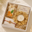 Golden Bloom™ Luxury Raksha Bandhan Gift Hamper | Floral Candle Holder, Soy Wax Aroma Sachet & Designer Rakhi Gift Box