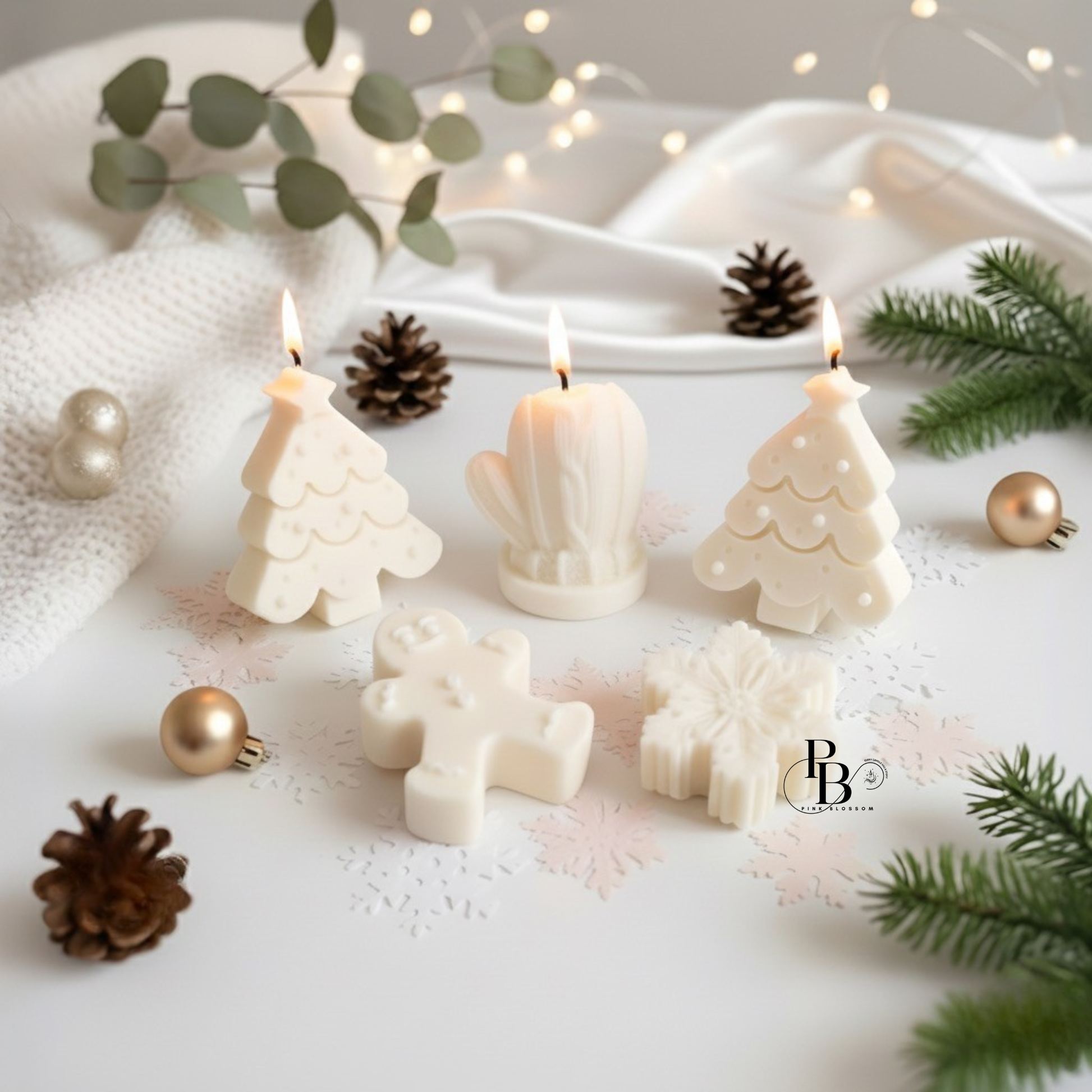Handmade Christmas decorative candles, white tree and pillar candles with flames