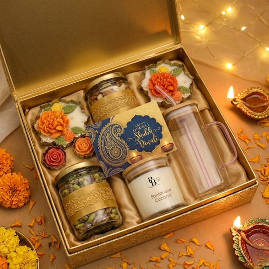 Luxury festive gift hamper box with scented jars, candle, and flower-shaped decor