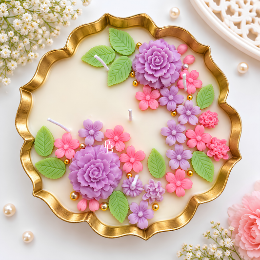 Mauve flower-pattern candle in a gold-rimmed round dish, with pink and purple sakura.